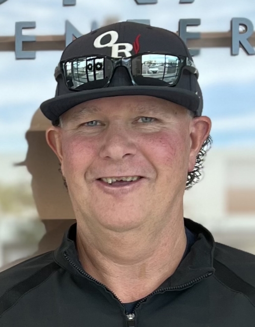 Man smiling with damaged teeth